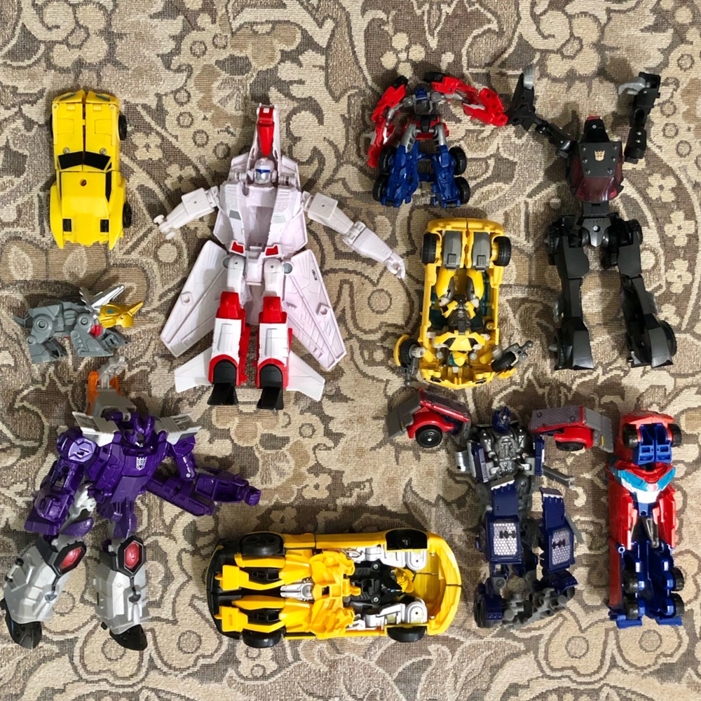 10 Transformers brand Transforming Toys Many with Missing Parts.